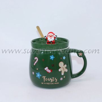 зелена чаша с коледни мотиви и капаче с дядо коледа