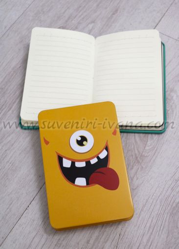 метален тефтер с физиономия на чудовище